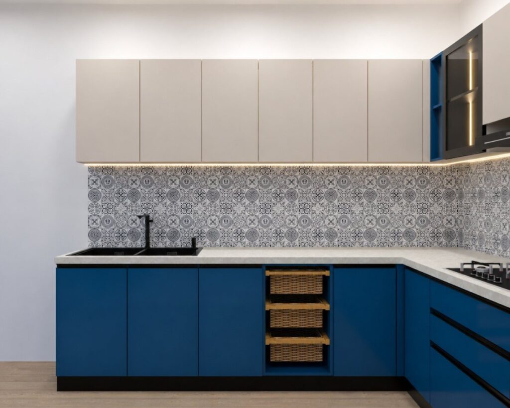 Blue lower kitchen cabinets with a patterned blue and white tile backsplash.