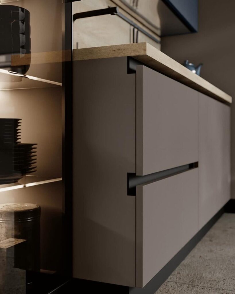 Matte grey handleless kitchen cabinets featuring a black Gola profile grip rail.